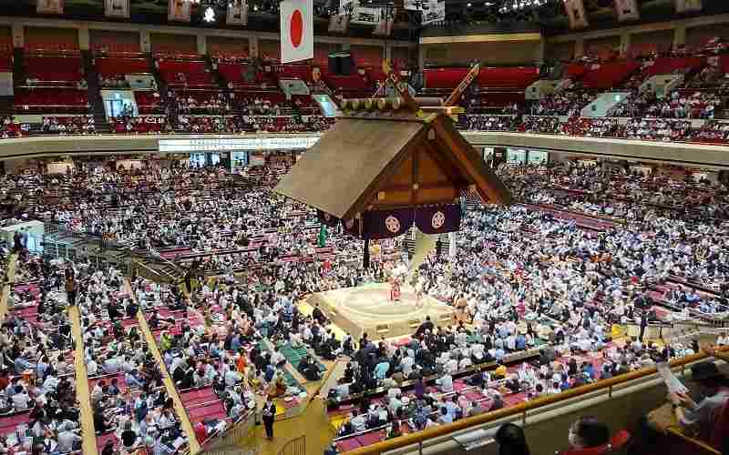 Rehabilitated sumo wrestler repays stablemaster with 1st