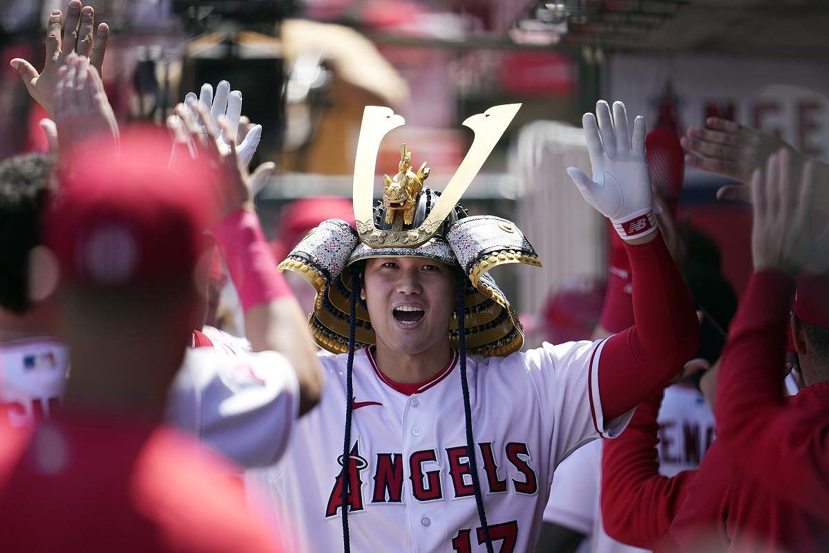 Angels score 11 in 3rd inning, thump Fujinami and A's 13-1