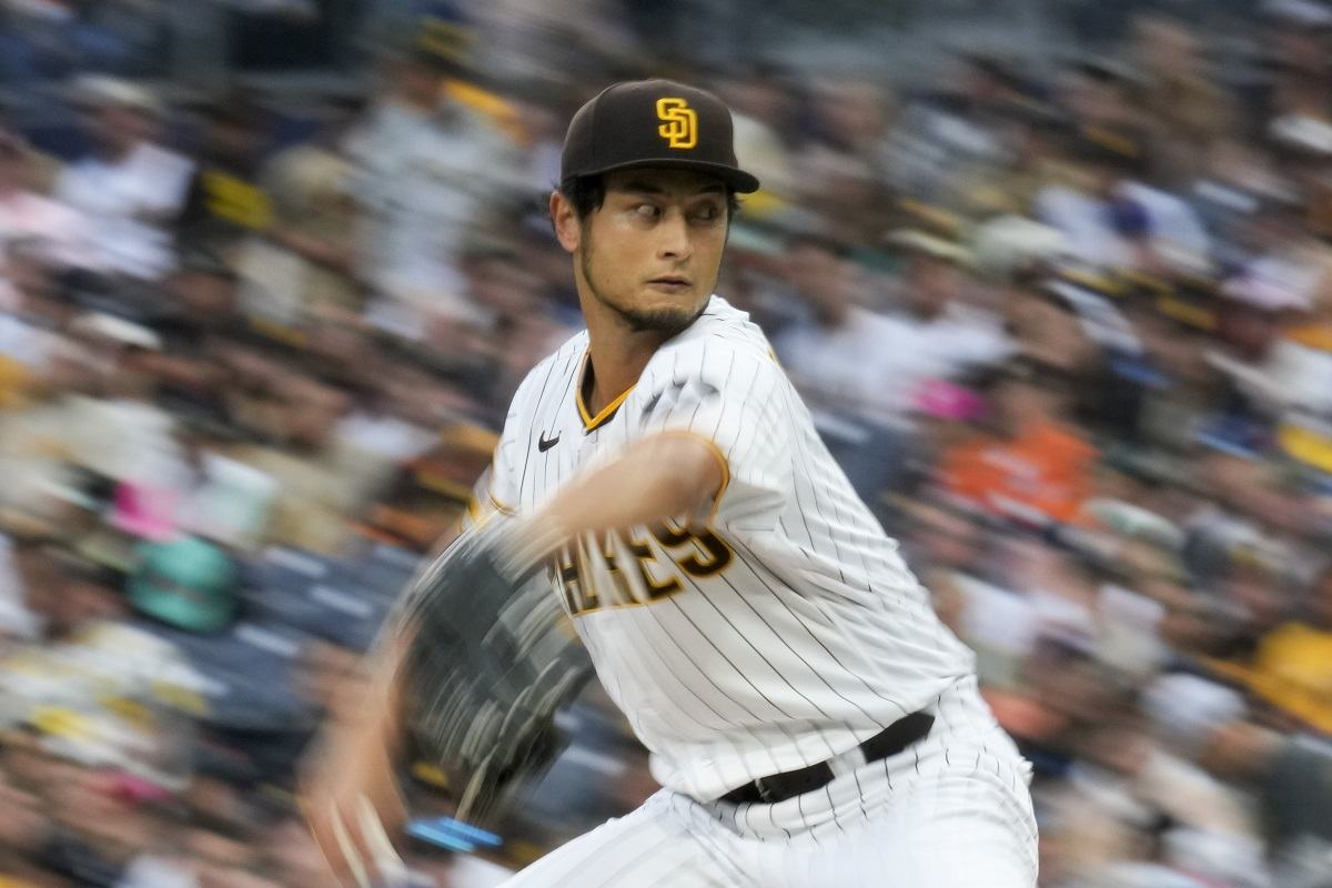 Shintaro Fujinami (L) of the Oakland Athletics and Masataka