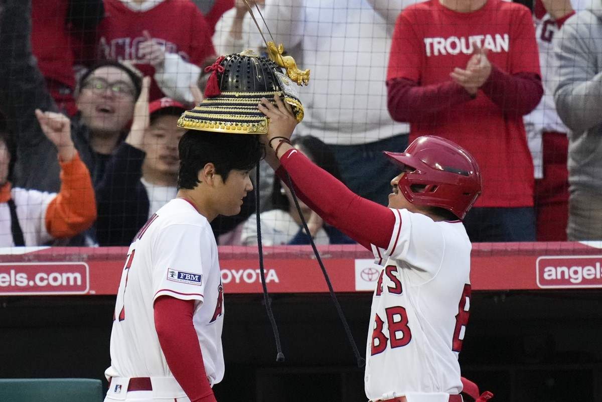 Los Angeles Angels' Shohei Ohtani rounds the bases after hitting a home run  during the fourth inning of a baseball game against the Chicago Cubs  Tuesday, June 6, 2023, in Anaheim, Calif. (