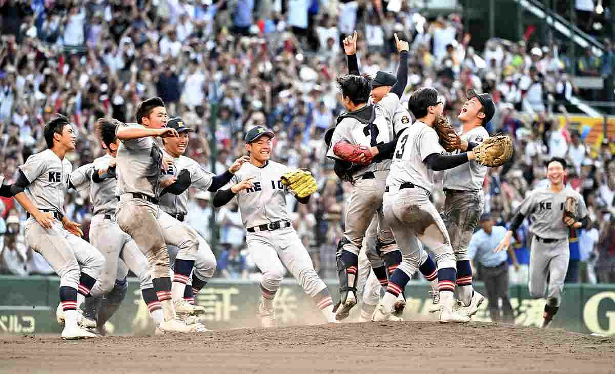 Japan national baseball team members celebrate after beating China