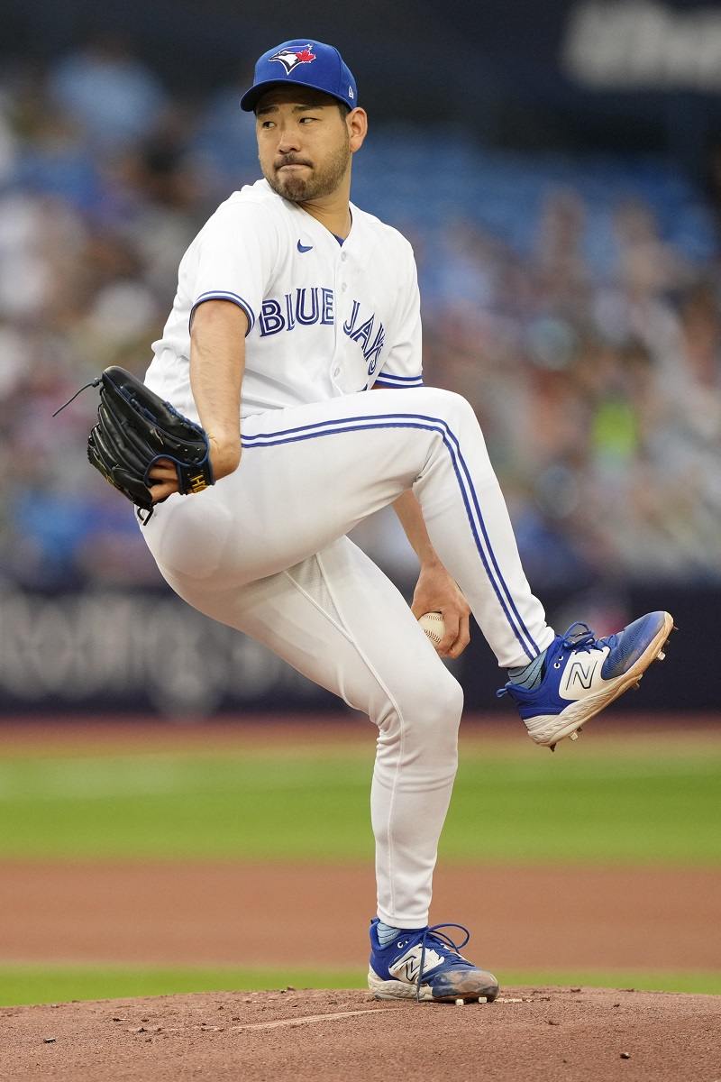 Toronto Blue Jays starting pitcher Yusei Kikuchi reacts as he