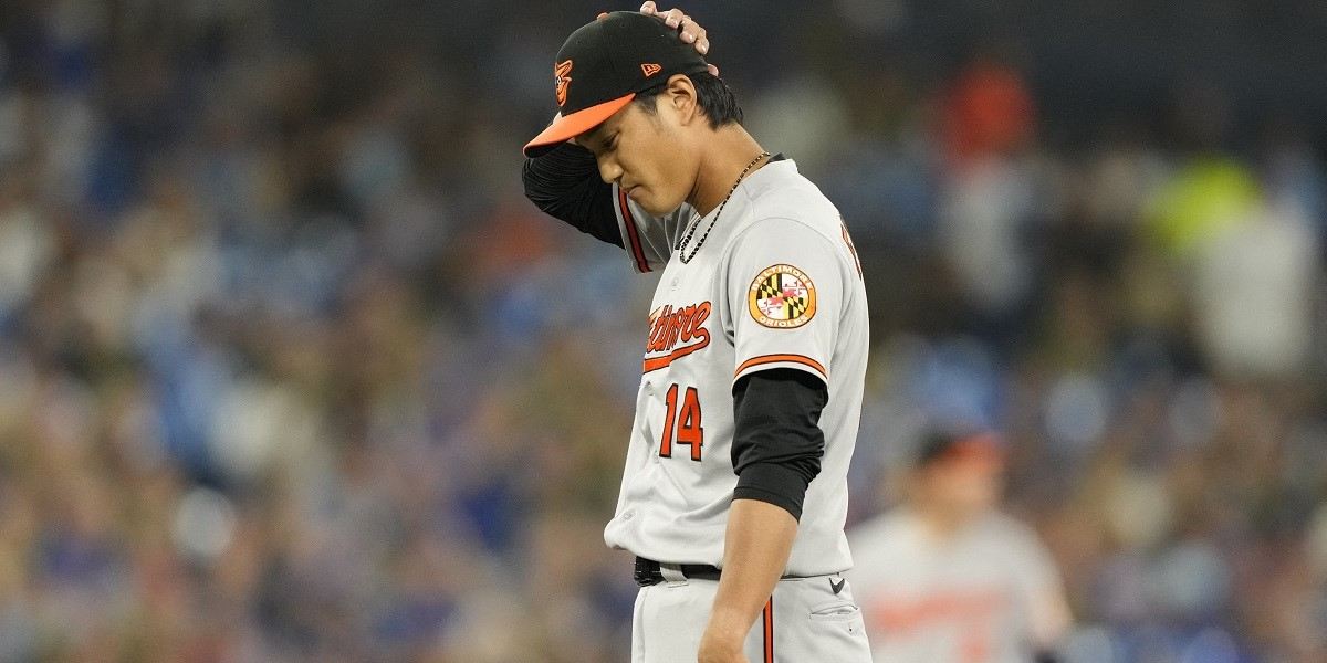 Toronto Blue Jays starting pitcher Yusei Kikuchi reacts as he