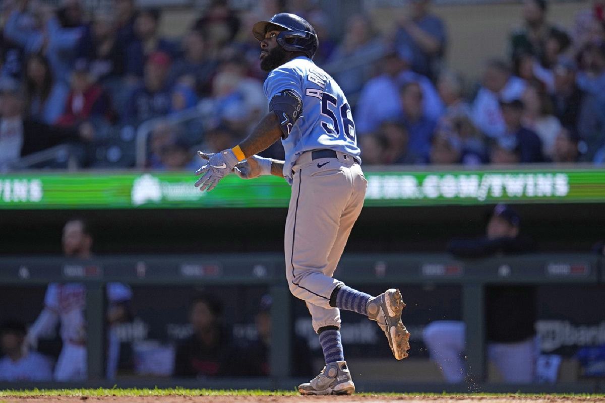 Tampa Bay Rays' Jose Siri heads for first base after hitting a