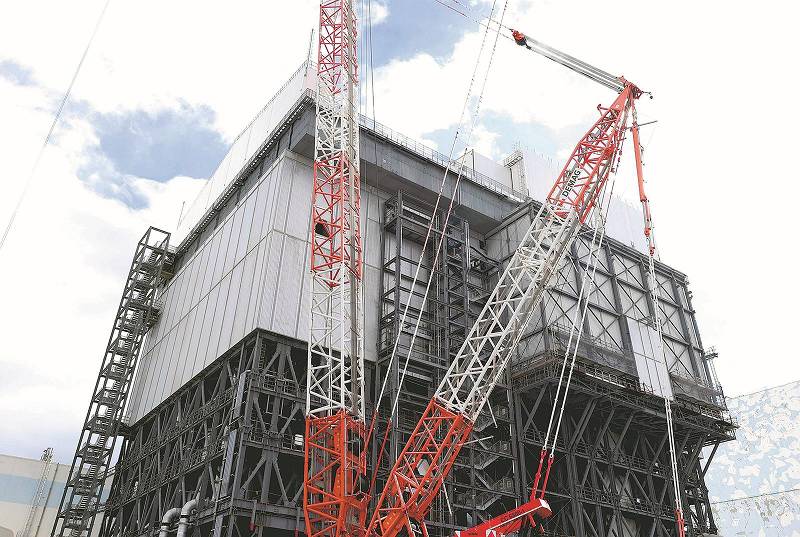White Panels at Fukushima Nuclear Power Plant Hide Scars of 2011 Accident